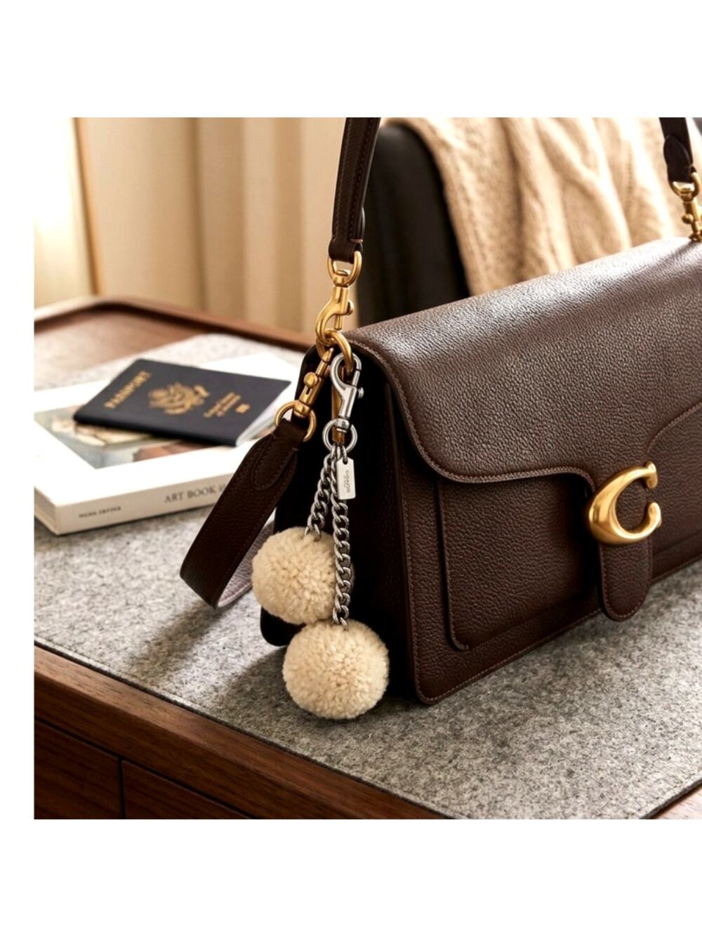Coach shearling pom pom bag charm silver-toned hardware fluffy white puff balls